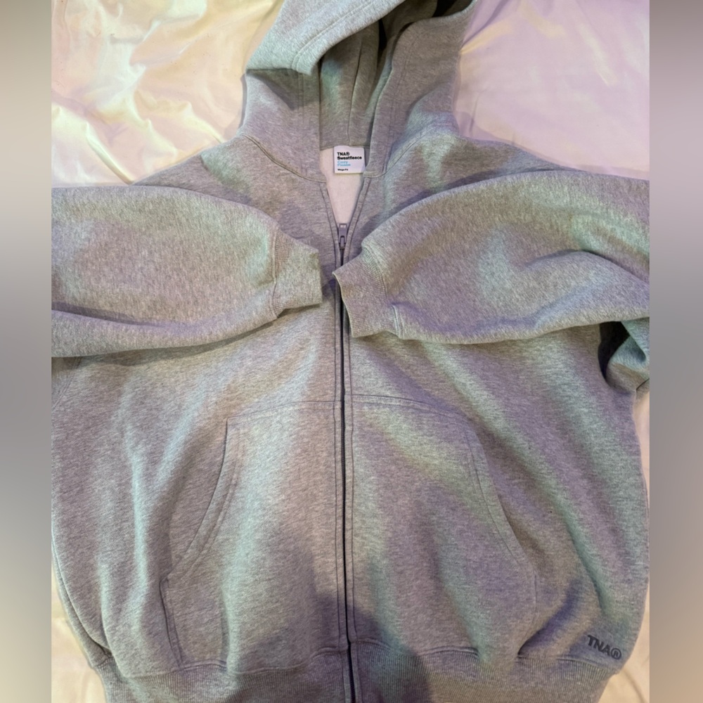 Grey Aritzia jacket.